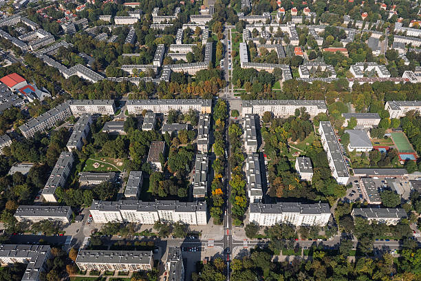 istock Apartment buildings and trees from above 2216343194