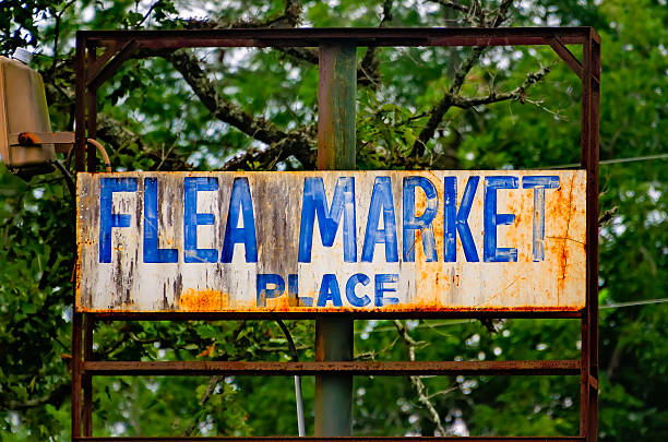 A rusted flea market sign is pictured, Aug. 8, 2023, in Mobile, Alabama. Flea markets are a type of street market that offers space for vendors to sell second-hand items.