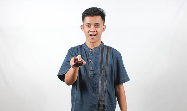 istock asian man wearing denim shirt holding mouse 2216351652