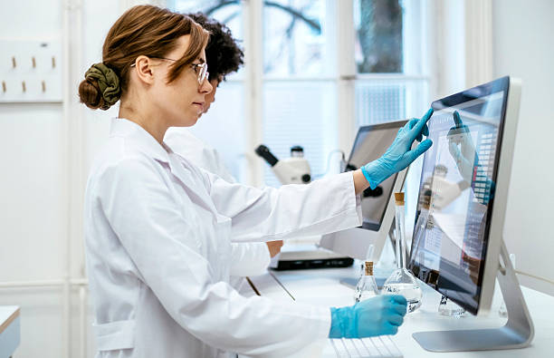 istock Focused Young Female Scientist Researching in a University Laboratory 2216352223