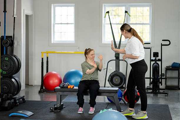istock Inclusive Fitness Training Session with Personal Trainer in Modern Gym Setting 2216352351