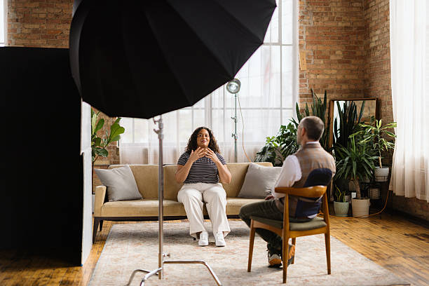 istock Woman sharing her story during an interview in a photo studio 2216352695