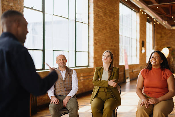 istock Business coach leading a workshop with his team in a modern office 2216352776