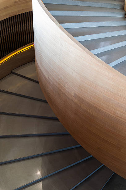 istock Curved Modern Wooden Spiral Staircase 2216353694