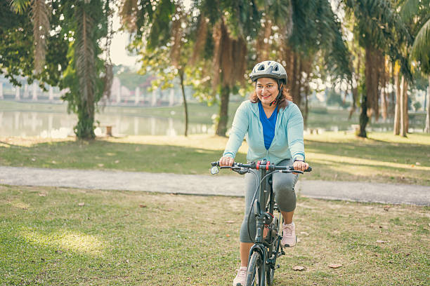 istock In Harmony with Nature: A Young Woman’s Serene Journey on Two Wheels 2216363388