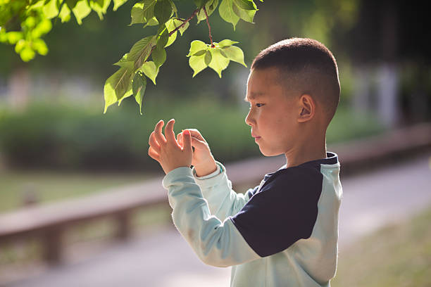 Baby picking weeds