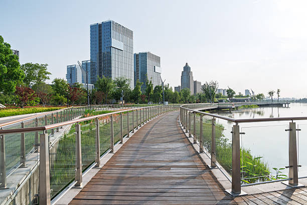istock empty urban road with city skyline 2216370524