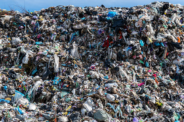 istock Large Landfill Pile Showing Discarded Waste and Trash Accumulation 2216370849