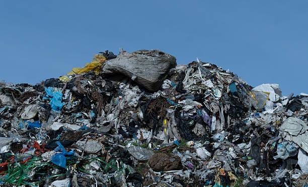 istock Large Pile of Mixed Waste and Refuse Against a Clear Sky 2216370851