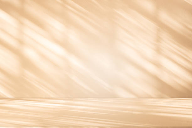 istock Studio style background wall decoration presentation uses white and beige tones. with shadows cast from a nearby window, concept creating a decorative 2216372769