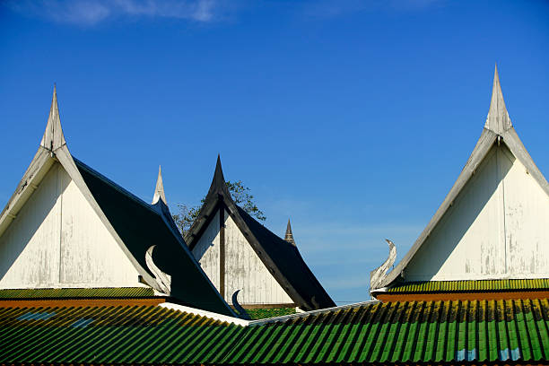 istock Traditional Rooftops with Unique Architectural Details Against Sky 2216374666