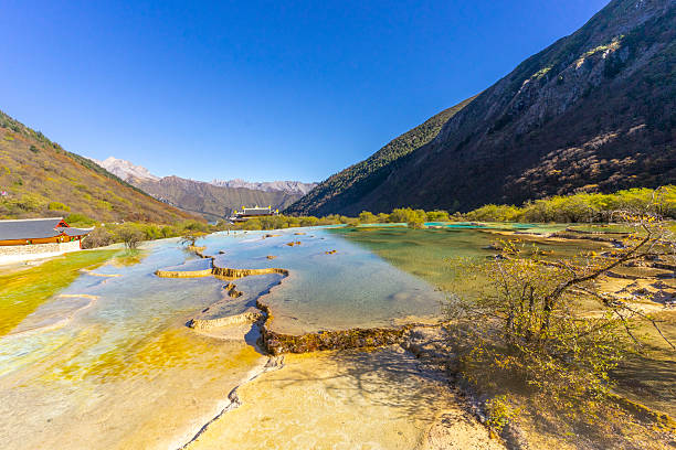 Multi-Colored Pool in Huanglong National Park, famous for its colorful pools formed by calcite deposits in Sichuan, China.