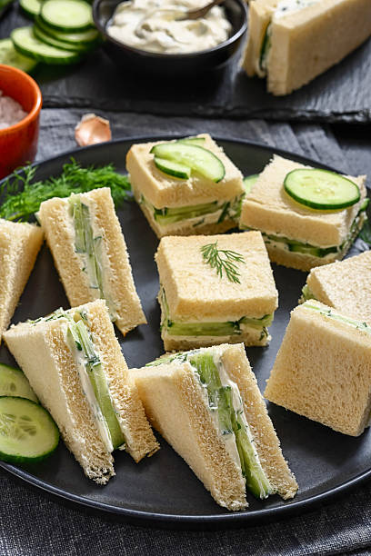 istock cucumber sandwiches with tasty cream cheese spread 2216386817