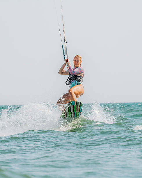 istock Young Woman Kitesurfing 2216391117