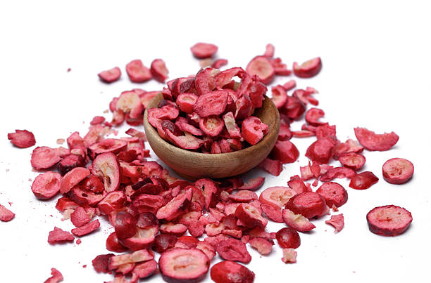 istock Freeze-dried cranberry fruit cut into slices, on a white background 2216391854