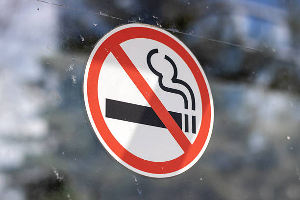 istock A Clear No Smoking Sign Displayed on a Transparent Glass Surface for Public Awareness 2216396453