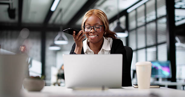 istock Smiling African Coach Speaks With Client On Smartphone 2216397217