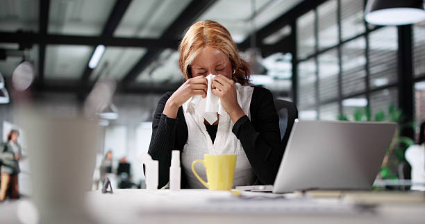 istock Nurse Comforts Sick Child With Fever 2216397273