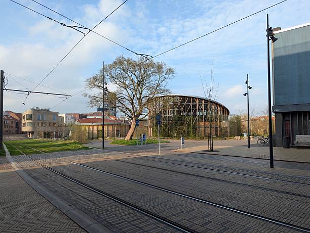 Modern urban landscape with tram tracks.