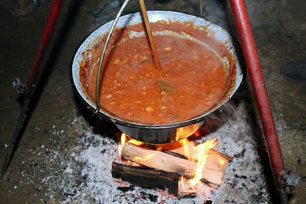 istock Traditional goulash cooking over open wood fire 2216405039