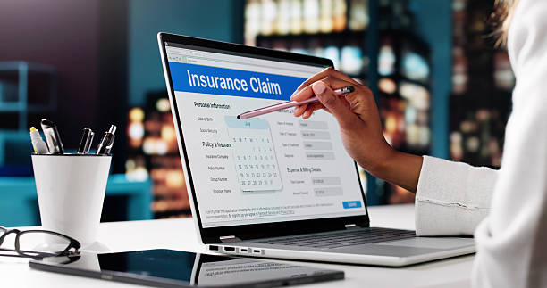 istock African American Woman Completing An Online Insurance Application 2216405744