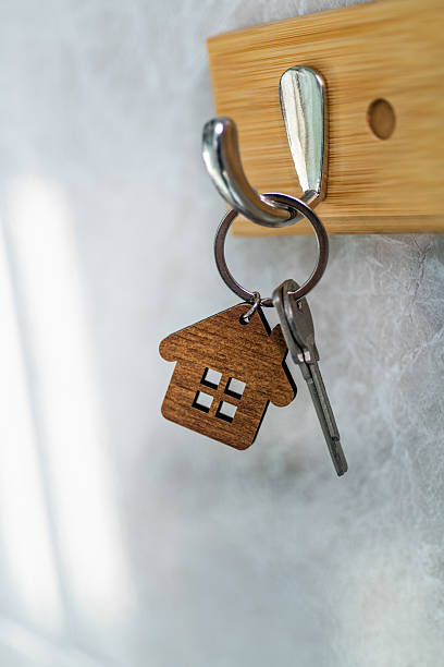 istock House keys with key ring hanging on the hook 2216406052