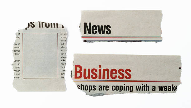 Three torn pieces of newspaper on white background