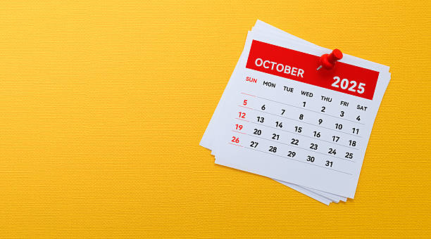 istock 2025 October calendar on yellow background 2216406370
