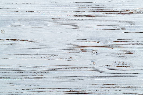 istock Texture of wooden board with white paint 2216406395