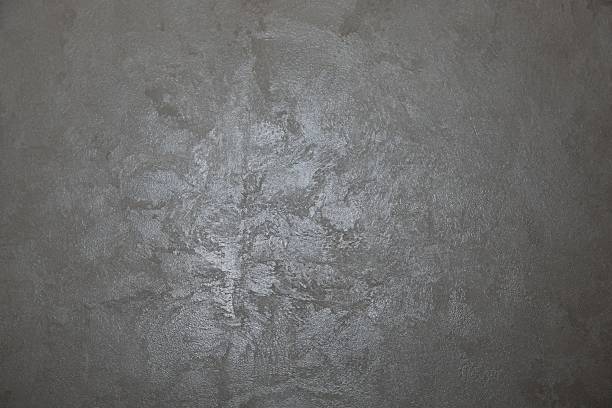 Elegant decorative plaster texture with pearlescent finish, beige wall background for interior design and architecture themes