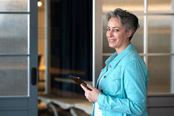 istock Modern Successful Businesswoman Smiling at Camera 2216407769