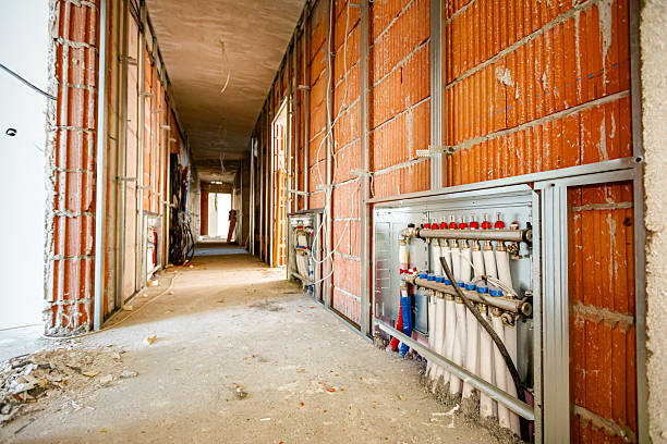 PEX plumbing manifold for water distribution in new home construction. Selective focus