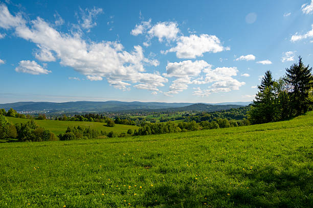 istock Ridge hiking trail from Javornik to Jested with scenic views into valleys and distant Jizera Mountains. Sunny summer day, peaceful nature and beautiful Czech landscape 2216408585