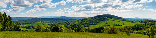 istock Ridge hiking trail from Javornik to Jested with scenic views into valleys and distant Jizera Mountains. Sunny summer day, peaceful nature and beautiful Czech landscape 2216408662