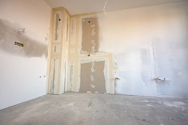 istock Assembled plasterboards on wall of an unfinished edifice on the building site 2216409201