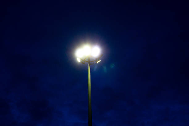 istock Lamppost at night. Light from an electric pole, lantern. 2216411358