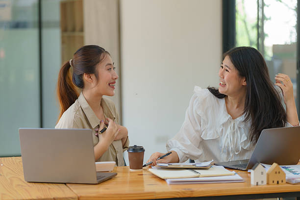 istock A young business team is working with business report documents on an office desk. Brainstorming Business People Design Planning, Brainstorming Planning Partnership. 2216418477