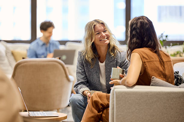 istock Female manager having conversation with colleague 2216468543