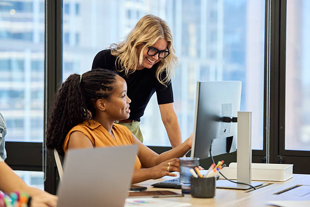 Female employee explaining strategies to manager