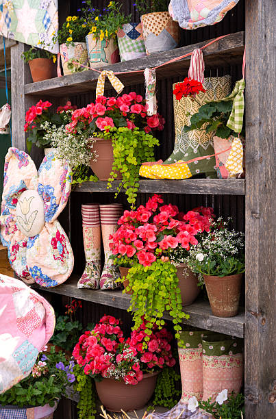 istock Dislpay of spring flowers and rain boots 2216469925