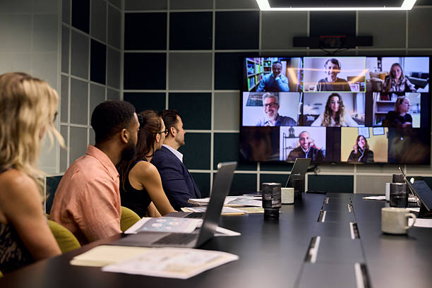istock Business employees talking with colleagues on video call 2216477331