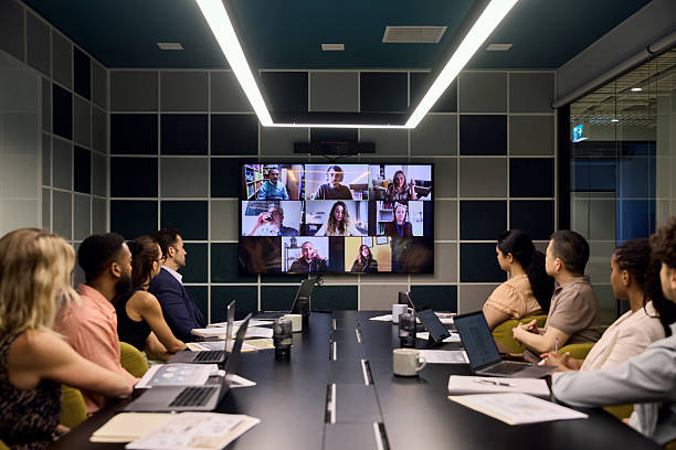 istock Group of business people attending video conference 2216477432