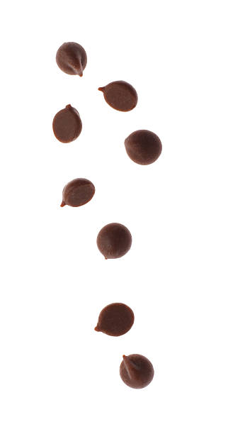 istock Many sweet chocolate chips isolated on white 2216477554