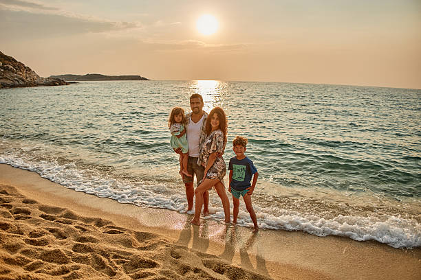 istock A family enjoying a tropical paradise beach during sunset 2216478538
