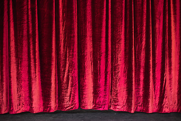 istock Closed theatre curtain before entertainment presentation or performance. 2216479876