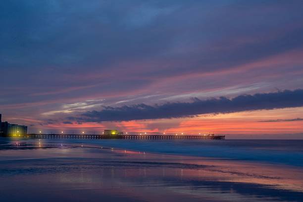 istock Serene sunset over a vibrant pier and ocean. 2216480926