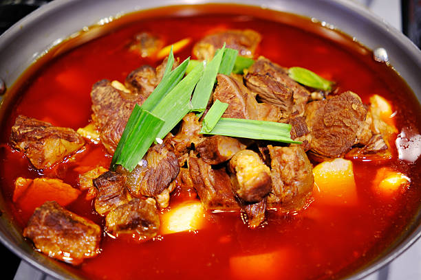 braised beef with sauce in pot. Chinese food
