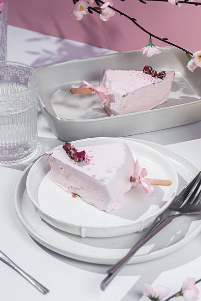 istock Cheesecake cake in a white plate on the table. Cheesecake in glaze 2216483912