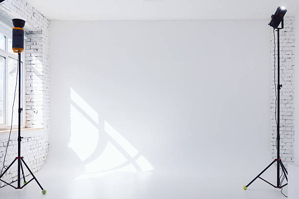 istock Clear white cyclorama. Light background with with professional lighting equipment. Plain wall empty photo studio. 2216487426