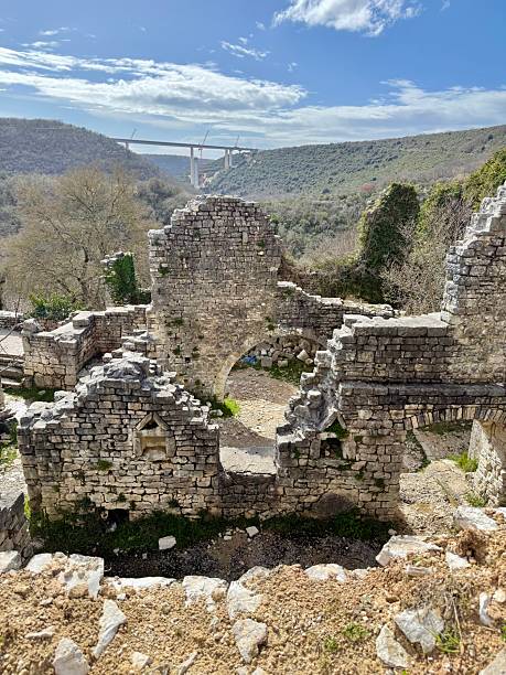 istock abandoned medieval town of Dvigrad in Istria, with ruins overlooking modern infrastructure in the valley 2216487821
